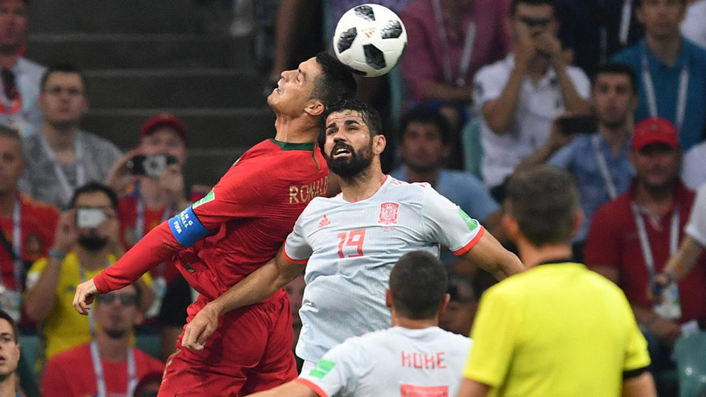Sochi (Russian Federation), 15/06/2018.- Diego Costa of Spain (R) and Cristiano Ronaldo (L) of Portugal in action during the FIFA World Cup 2018 group B preliminary round soccer match between Portugal and Spain in Sochi, Russia, 15 June 2018.