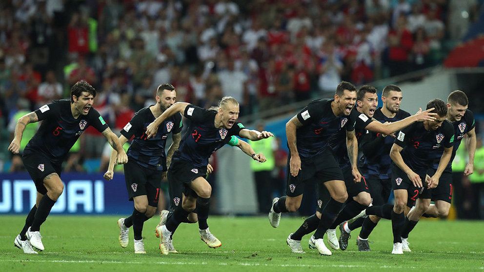 Sochi (Russian Federation), 07/07/2018.- Players of Croatia celebrate winning the penalty shoutout of the FIFA World Cup 2018 quarter final soccer match between Russia and Croatia in Sochi, Russia, 07 July 2018. (RESTRICTIONS APPLY: Editorial Use Only, not used in association with any commercial entity - Images must not be used in any form of alert service or push service of any kind including via mobile alert services, downloads to mobile devices or MMS messaging - Images must appear as still images and must not emulate match action video footage - No alteration is made to, and no text or image is superimposed over, any published image which: (a) intentionally obscures or removes a sponsor identification image; or (b) adds or overlays the commercial identification of any third party which is not officially associated with the FIFA World Cup) (Croacia, Mundial de Fútbol, Rusia) EFE/EPA/MOHAMED MESSARA EDITORIAL USE ONLY