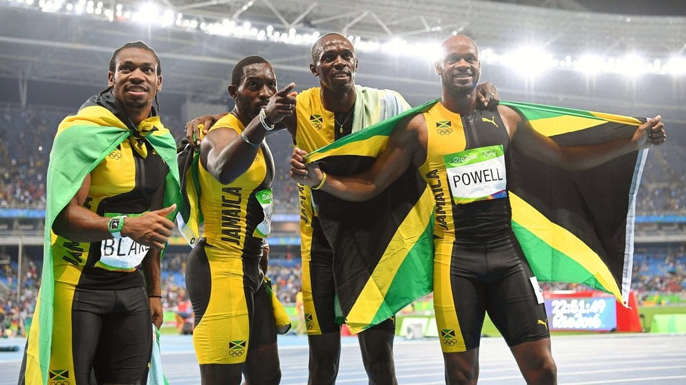 . Rio De Janeiro (Brazil), 19/08/2016.- (L-R) Yohan Blake, Nickel Ashmeade, Usain Bolt, and Asafa Powell of Jamaica celebrate after winning the men's 4x100m relay final of the Rio 2016 Olympic Games Athletics, Track and Field events at the Olympic Stadium in Rio de Janeiro, Brazil, 19 August 2016. (Atletismo, Brasil) EFE/EPA/BERND THISSEN