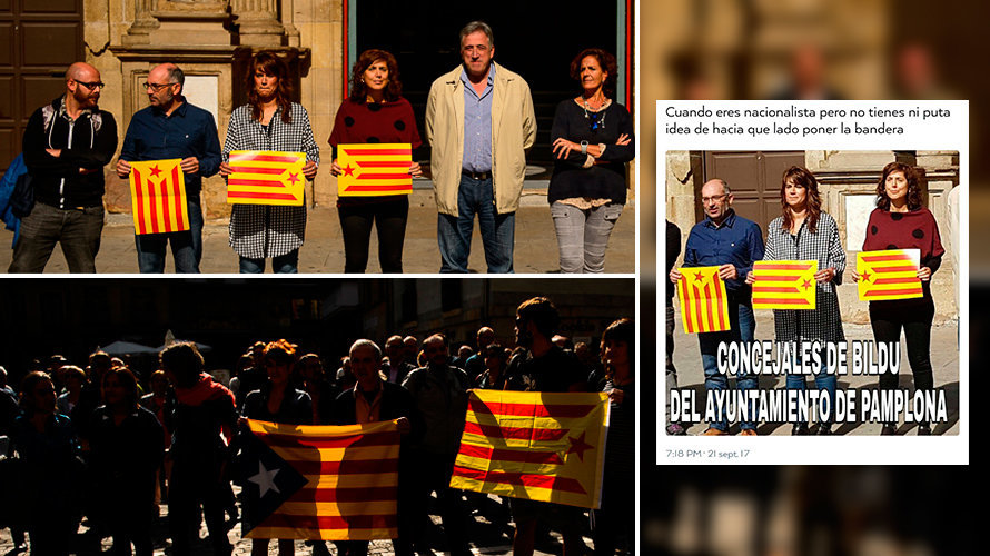 Varios miembros de EH Bildu sujetando la bandera independentista catalana en la plaza del Ayuntamiento de Pamplona. PABLO LASAOSA (2)