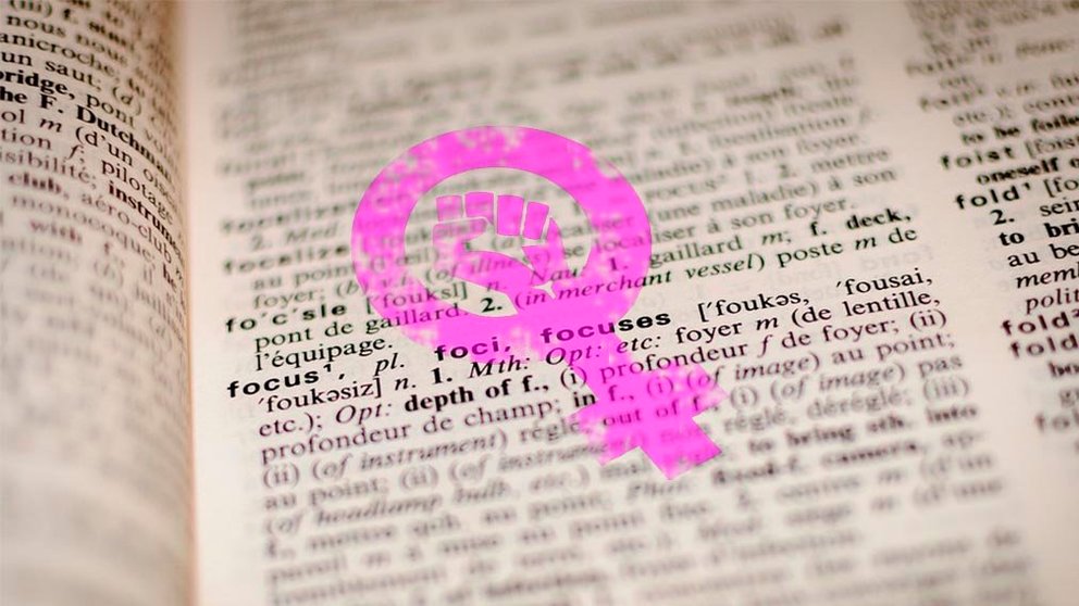 Un diccionario y el símbolo feminista