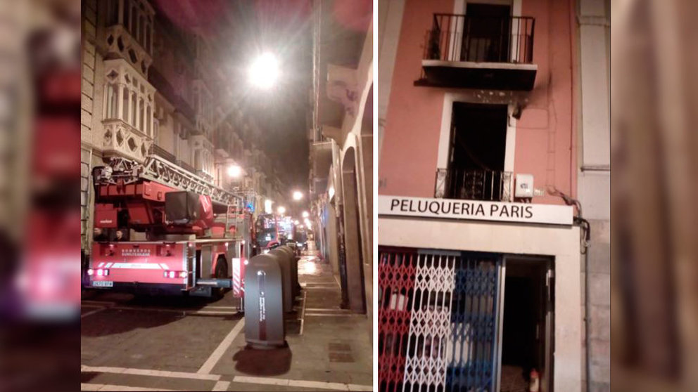 Varios camiones de los bomberos trabajan para sofocar las llamas en una vivienda de la calle Mayor de Pamplona. BOMBEROS DE NAVARRA