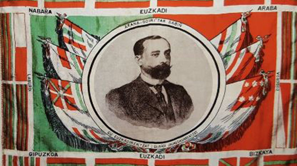 Pañuelo diseñado por Luis Arana con la efigie de su hermano Sabino y las banderas de los seis territorios vascos de la confederación aranista