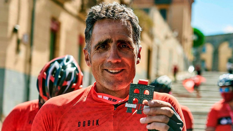 Miguel Induráin participa en una carrera en Segovia patrocinada por una entidad bancaria. @123acorrer